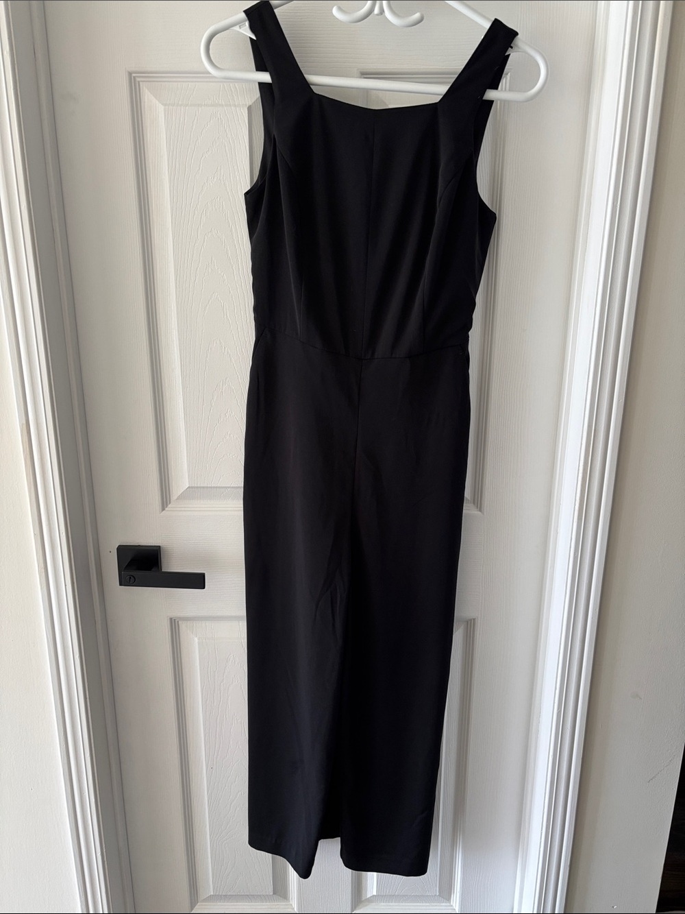 Classic Black Sleeveless Jumpsuit with Open Tie Back Detail